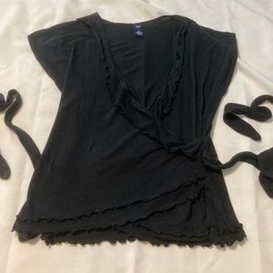 Gap Women’s black knit wrap top in size L.
